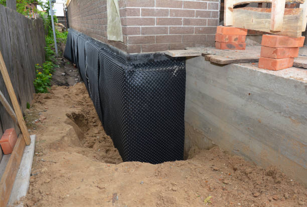 SJ Waterproofing Pros technician performing targeted Waterproofing assessment in Newport, SC